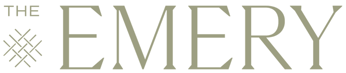 The image shows the text "THE EMERY" in large, bold letters with a decorative element to the left of "THE".